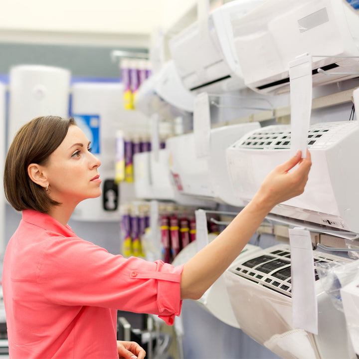 Female shopping for new air conditioner